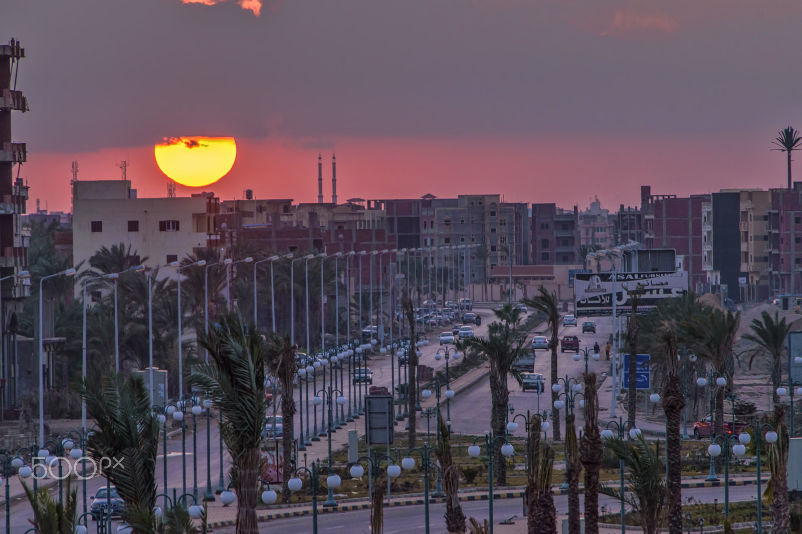 Sigma 18-250mm F3.5-6.3 DC OS HSM sample photo. Winter sunset above city photography
