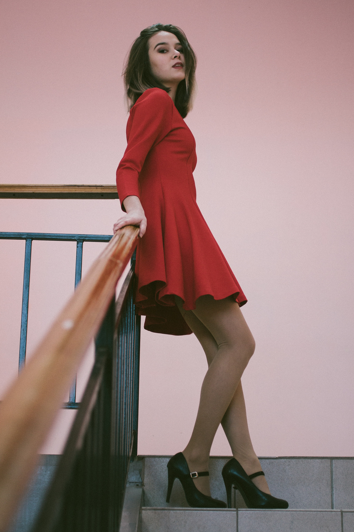 Canon EOS 7D sample photo. Young girl in a red dress next to the stairs. photography