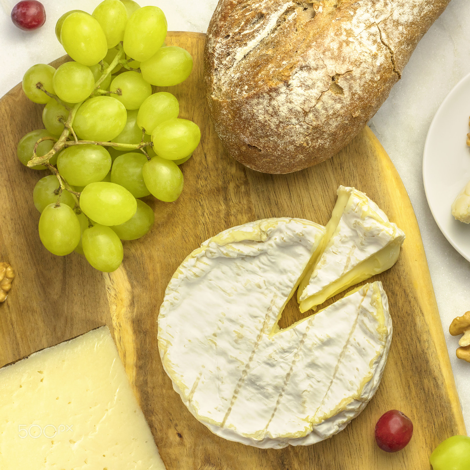 Canon EOS 5DS R sample photo. Round of camembert cheese with bread and grapes photography