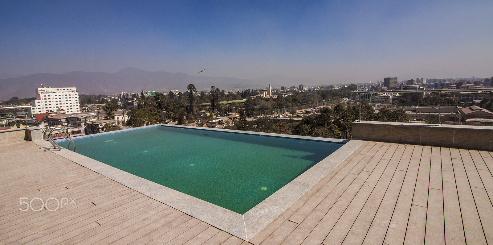 Canon EOS 500D (EOS Rebel T1i / EOS Kiss X3) sample photo. Kathmandu by the pool photography
