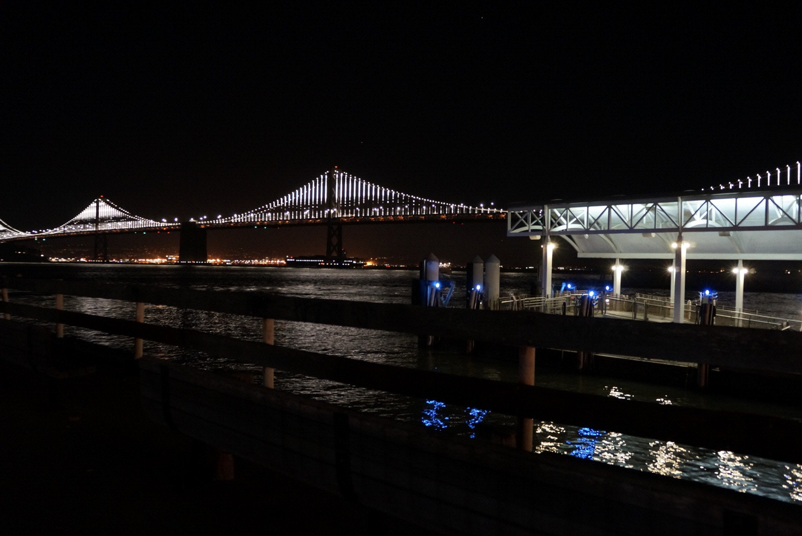 Sony Alpha NEX-6 + Sony E 18-55mm F3.5-5.6 OSS sample photo. Bay bridge, dock and pier at night photography