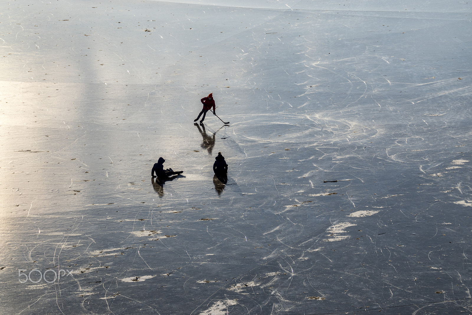 Sony DT 18-200mm F3.5-6.3 sample photo. Ice skating outdoors photography