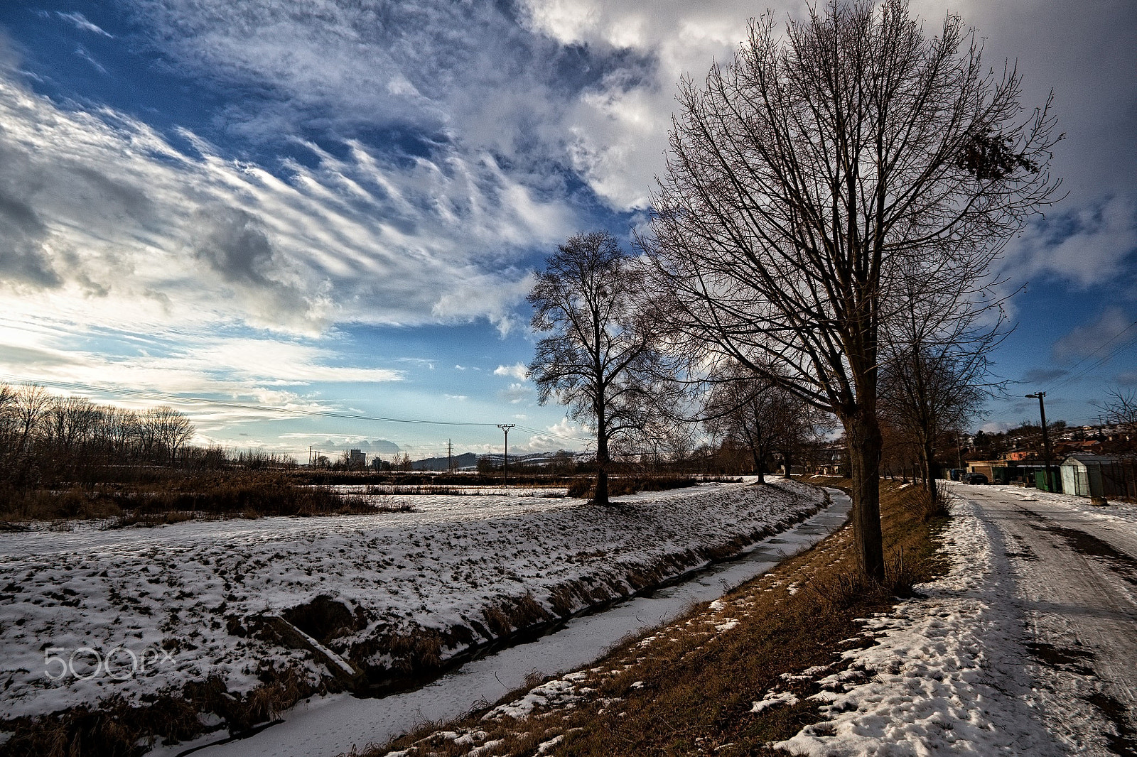 Canon EF-S 10-22mm F3.5-4.5 USM sample photo. Path, river, tree alley and electricity pylons photography