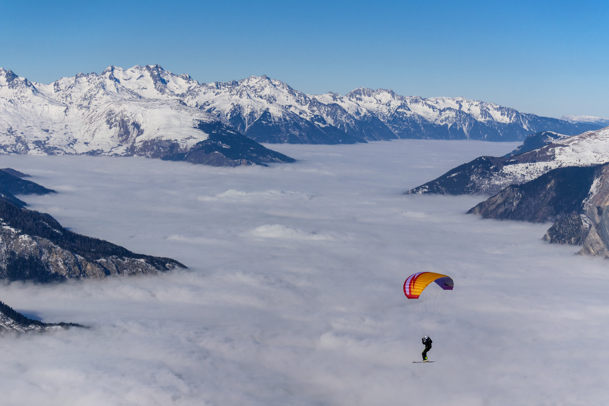 Nikon 1 J5 sample photo. Paragliding skiing and sea of clouds in the alps photography