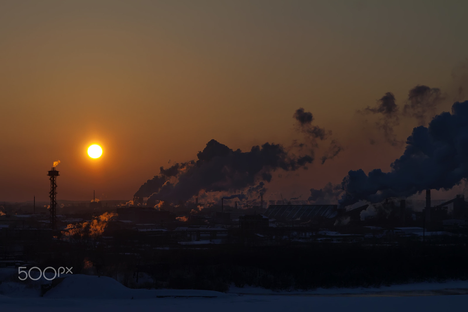 Canon EOS 500D (EOS Rebel T1i / EOS Kiss X3) + Sigma 24-70mm F2.8 EX DG Macro sample photo. Sunset over industrial area photography