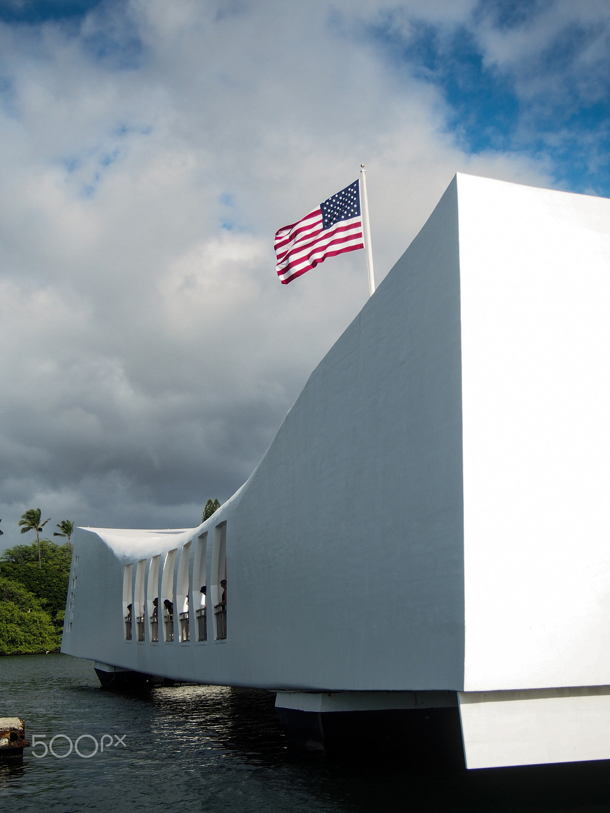 Olympus OM-D E-M5 sample photo. American flag flys over the arizona memorial on oahu hawaii in remembrance of pearl harbor photography
