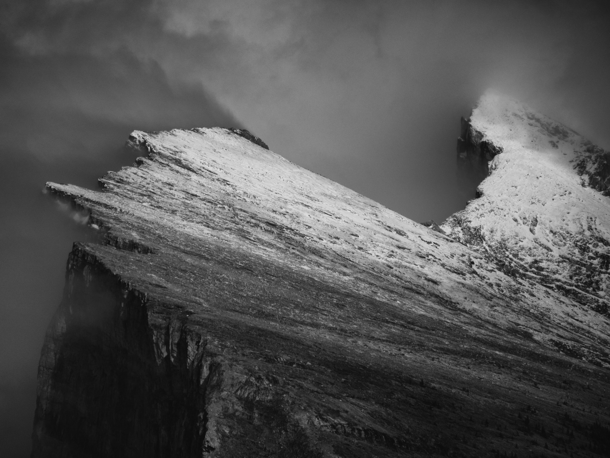 Olympus OM-D E-M5 sample photo. Mount rundle summit in black and white, photography