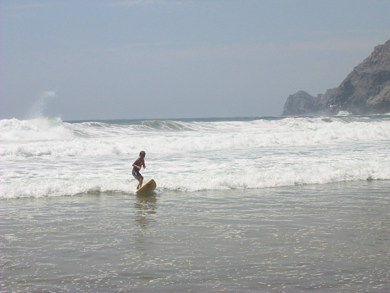 Canon POWERSHOT A10 sample photo. Kid surfing photography