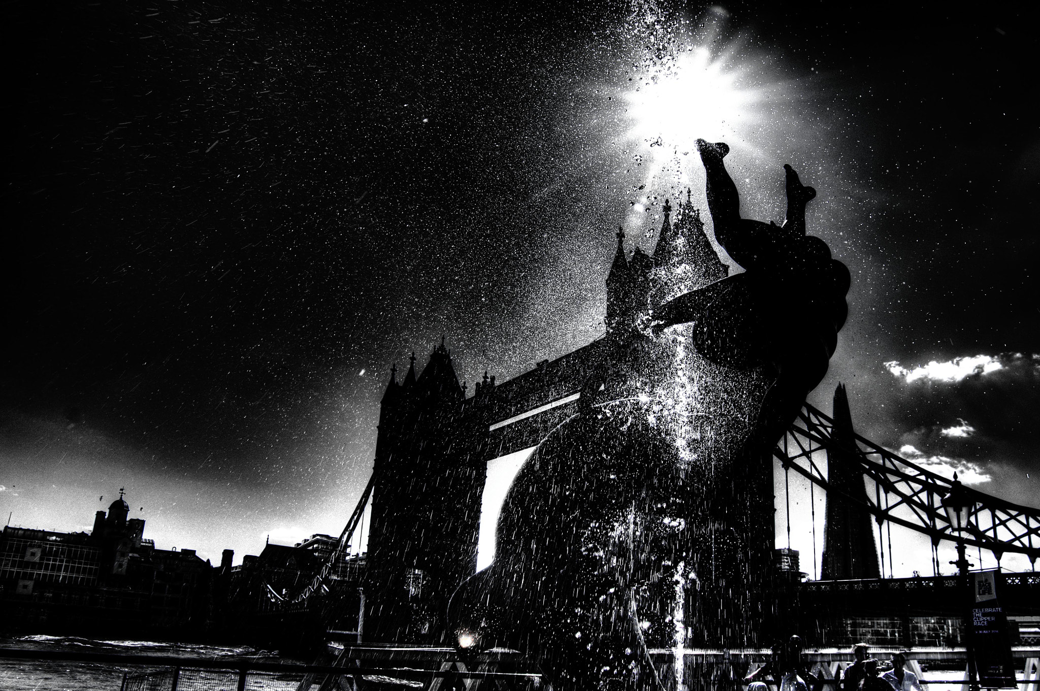 Pentax K-7 sample photo. Sunny day at tower bridge. the falling fountain water glistened in the sky to mimic stars. photography