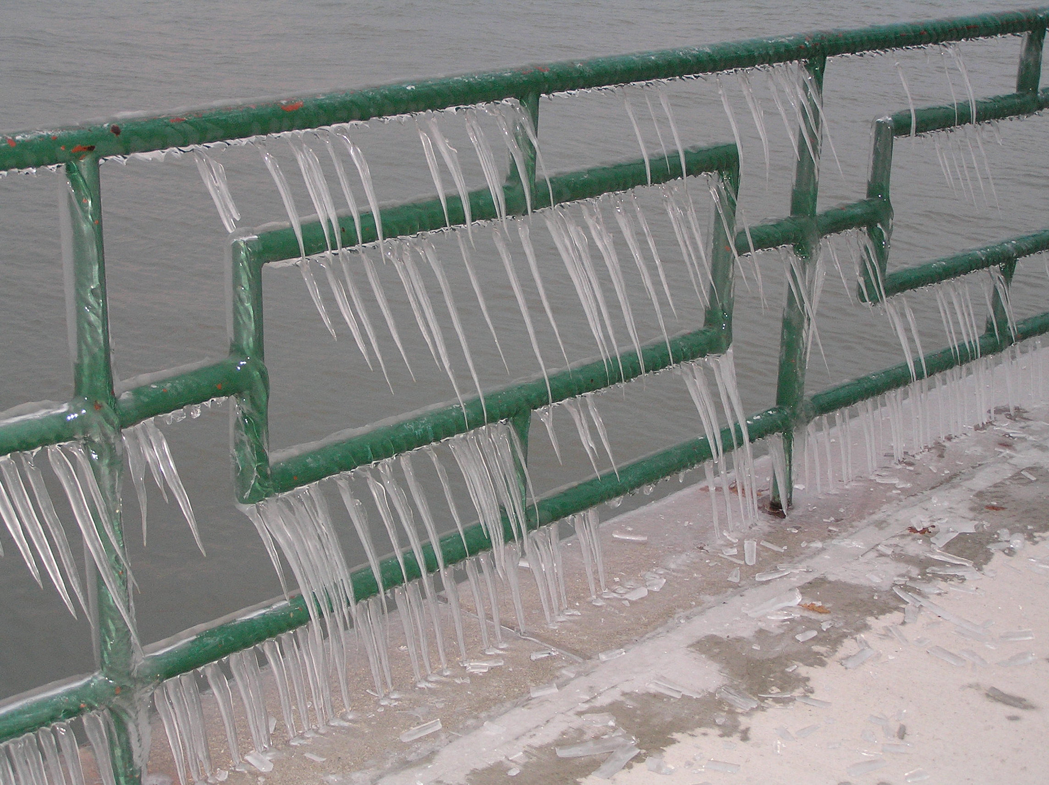 Olympus C770UZ sample photo. Ice from waves on fence at coventry gardens photography