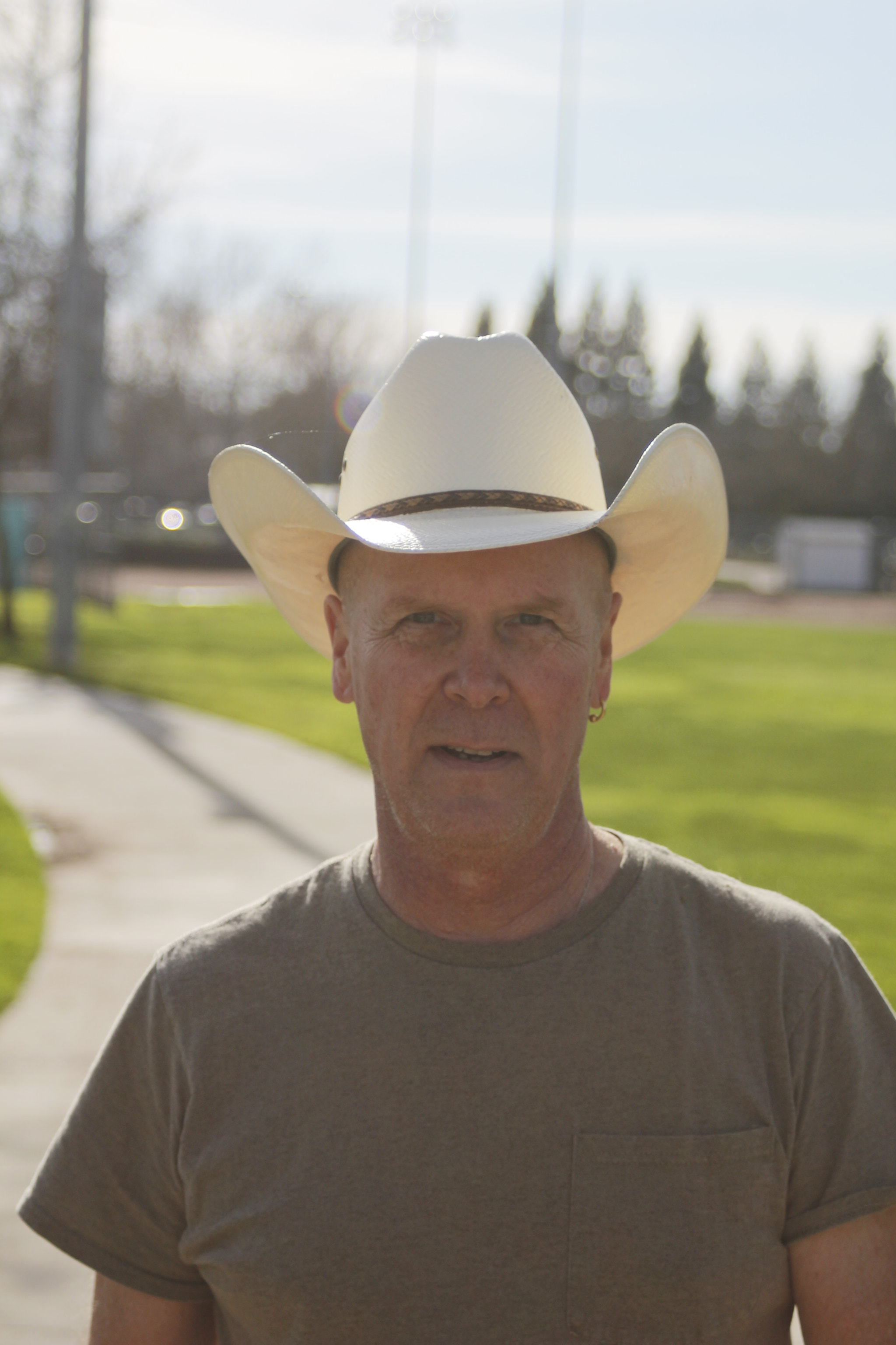 Canon EF 28-90mm f/4-5.6 sample photo. Suburban cowboy photography