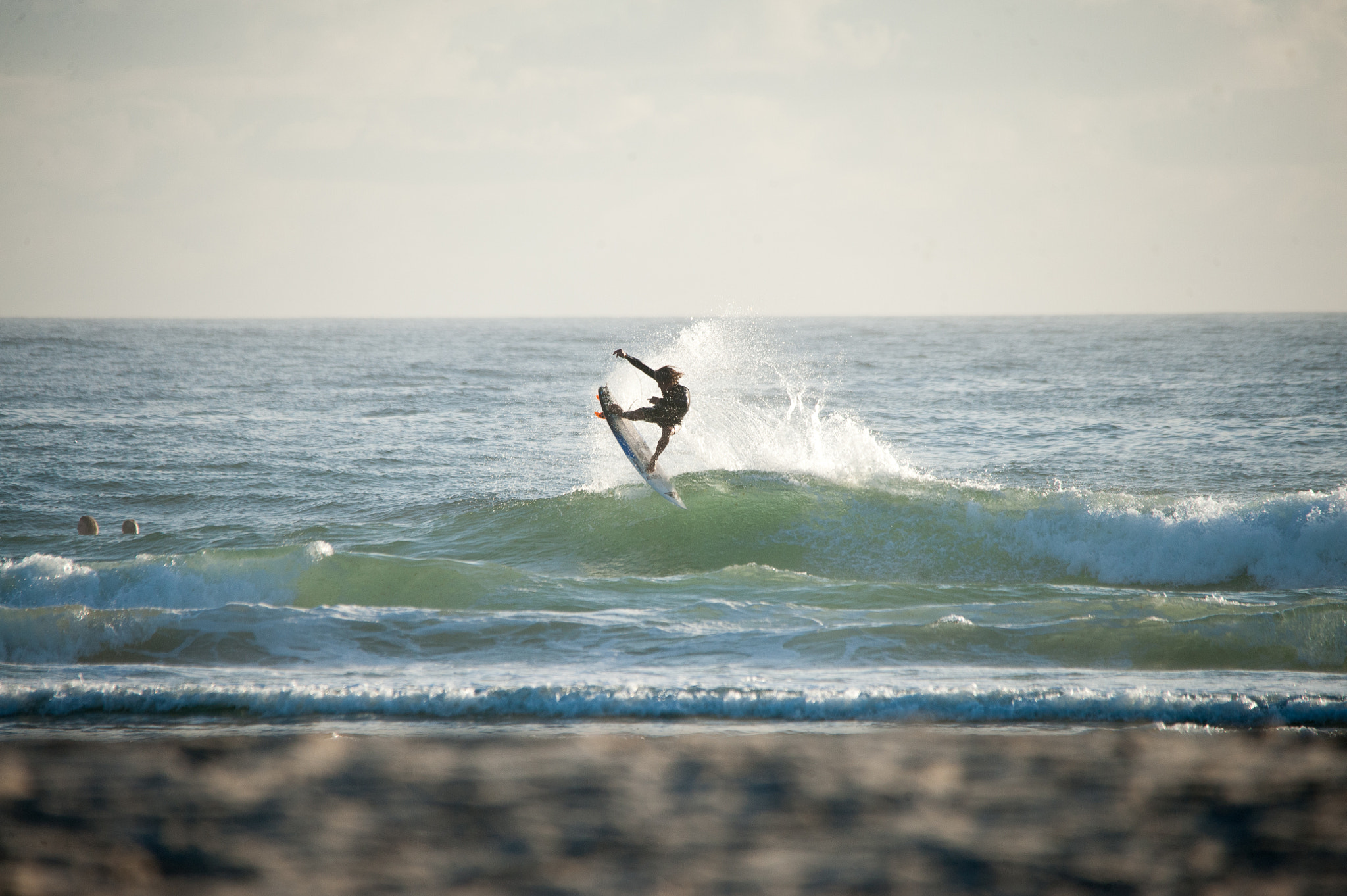 Nikon D3 + Sigma 150-500mm F5-6.3 DG OS HSM sample photo. Tail high in a fun morning surf photography