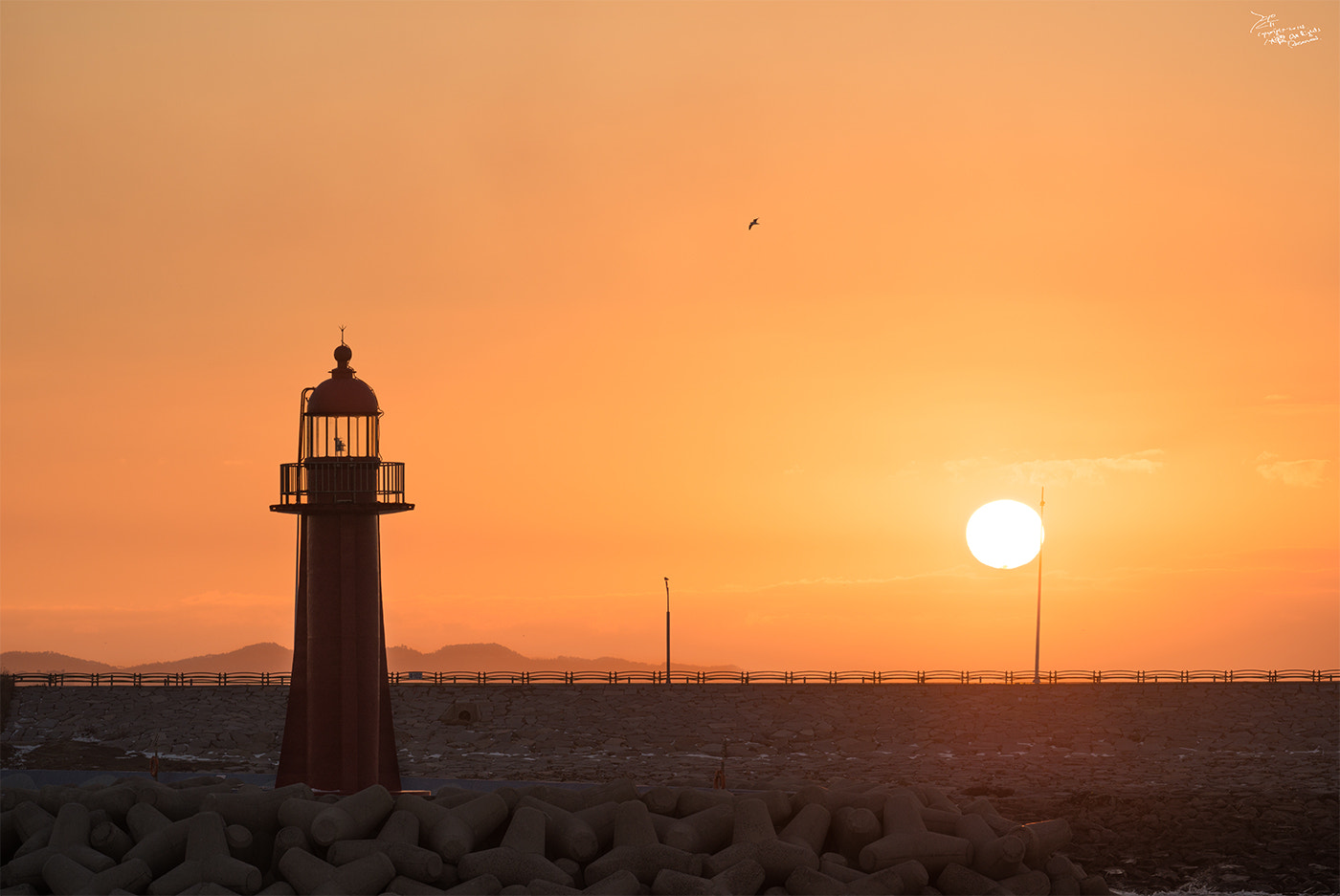 Nikon AF-S Nikkor 200-500mm F5.6E ED VR sample photo. Lighthouse and the sun photography