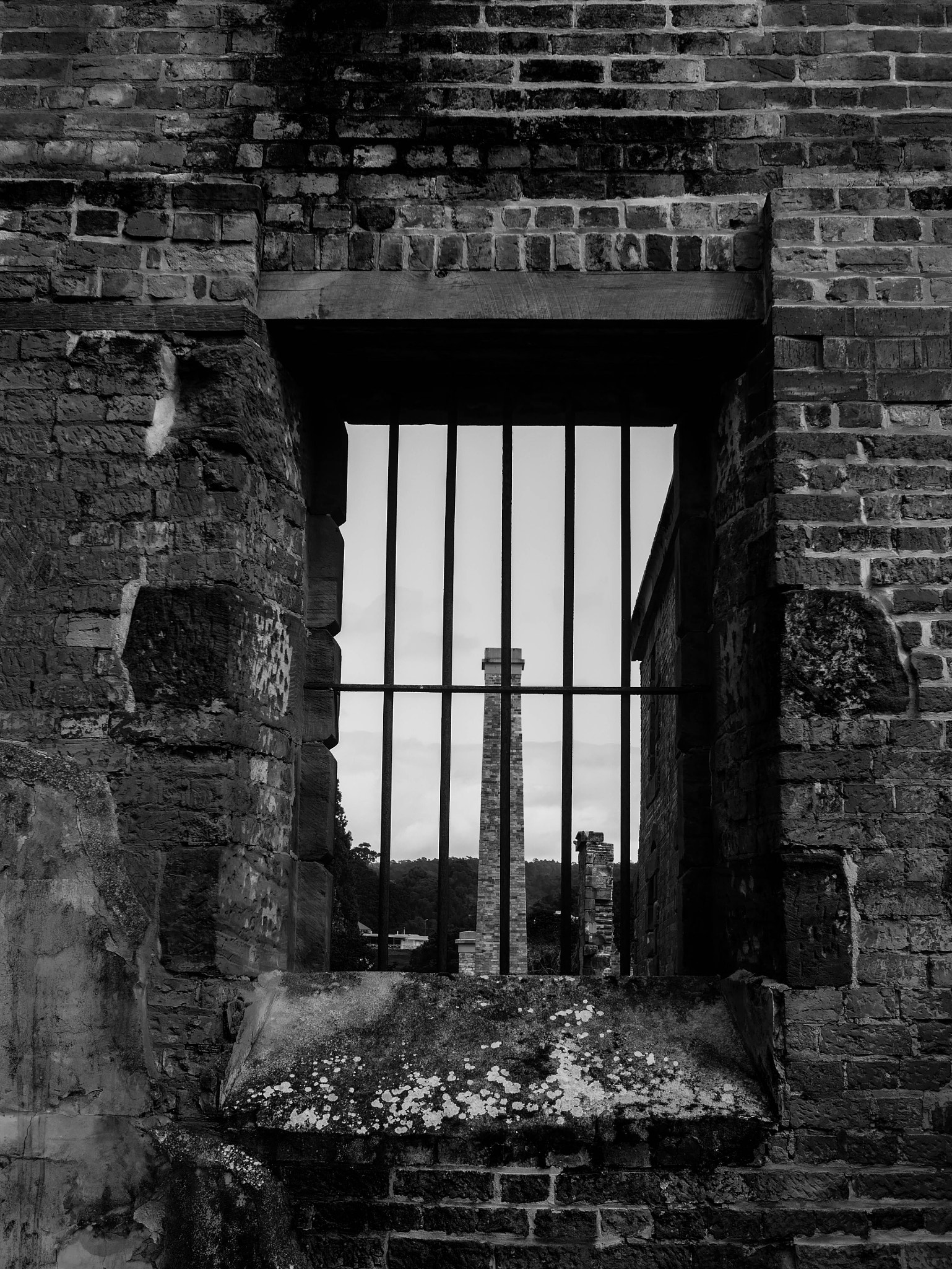 LUMIX G 25/F1.7 sample photo. Burned prison photography