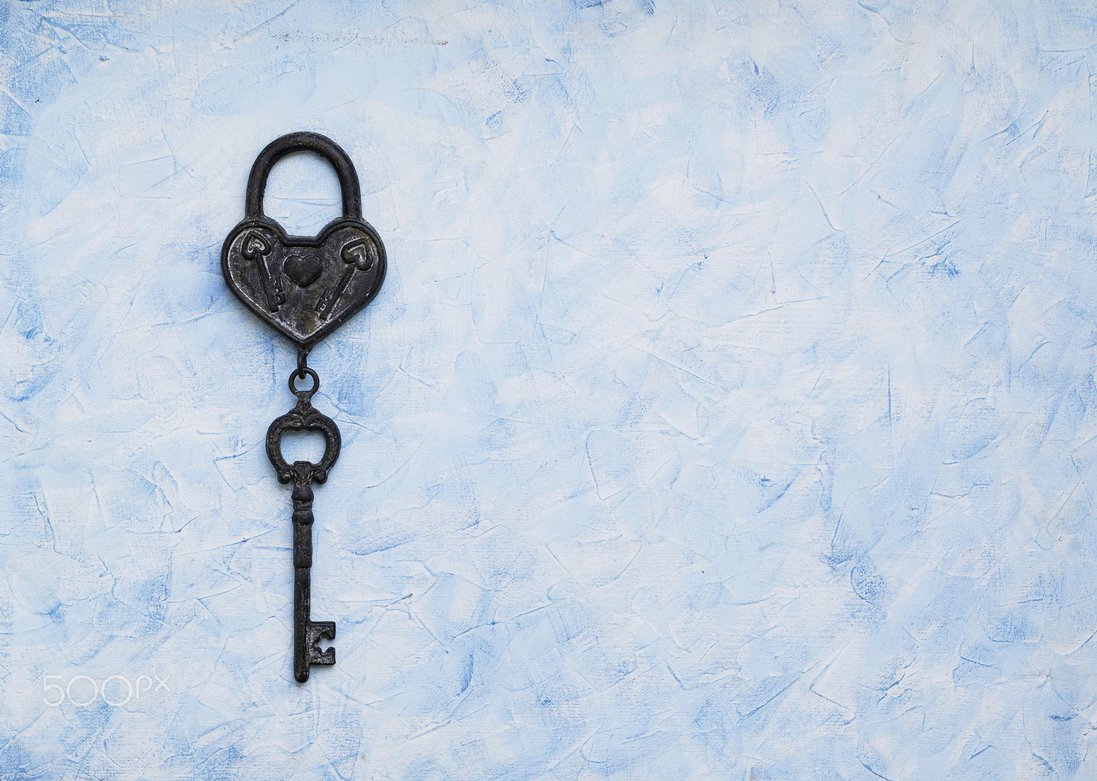 Nikon D7000 + Nikon AF-S DX Micro Nikkor 40mm F2.8 sample photo. Iron key from the lock lying on wooden vintage background, top view photography