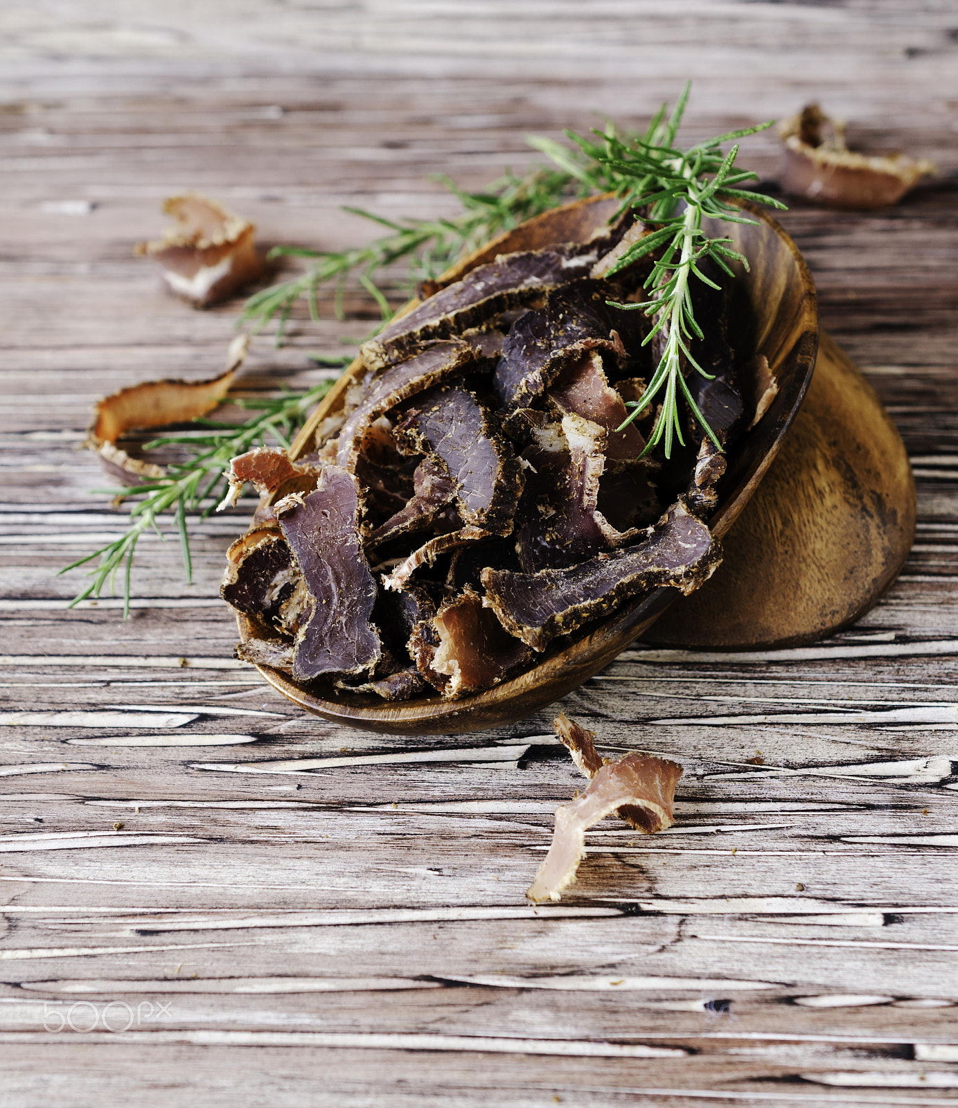 Nikon D7000 + Nikon AF-S DX Micro Nikkor 40mm F2.8 sample photo. Jerked meat, cow, deer, wild beast or biltong in wooden bowls on a rustic table photography