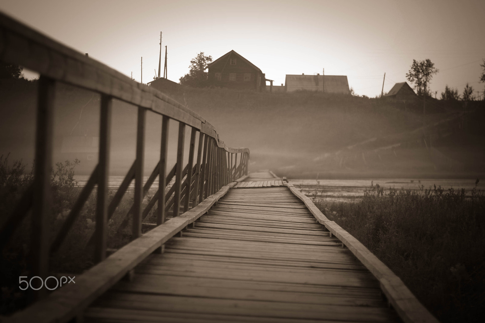 Canon EOS 1000D (EOS Digital Rebel XS / EOS Kiss F) + Canon EF 50mm F1.8 II sample photo. Old wooden bridge to village hill. vintage gothic rustic black and white photo photography