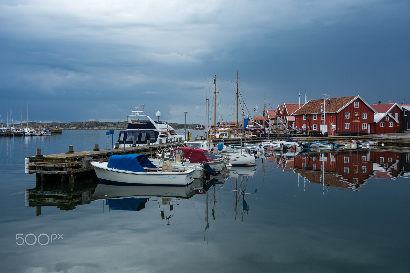 Nikon D7100 sample photo. Skärhamns pier water reflections photography