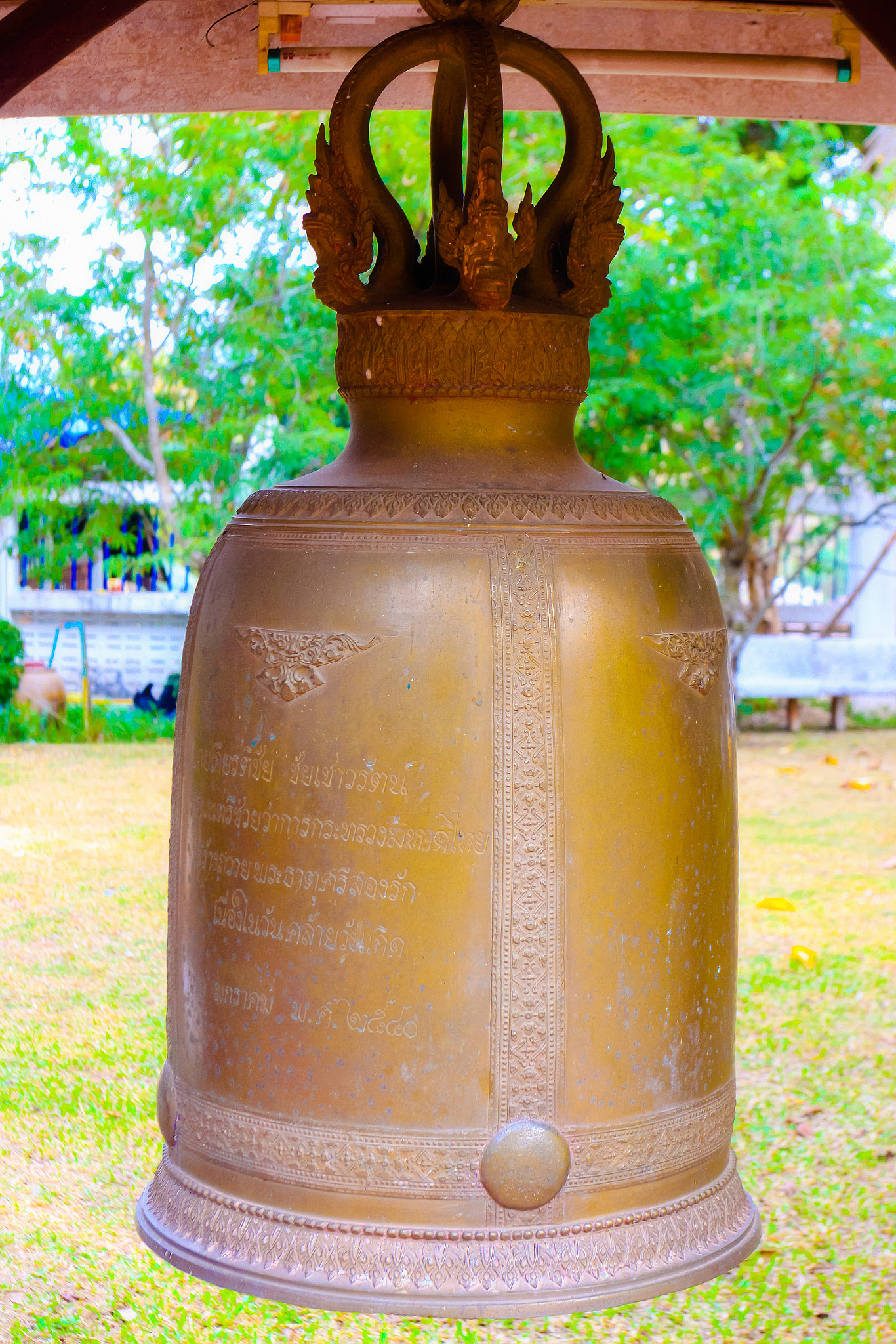Canon EOS 50D + Canon EF 17-40mm F4L USM sample photo. Golden religion bell photography