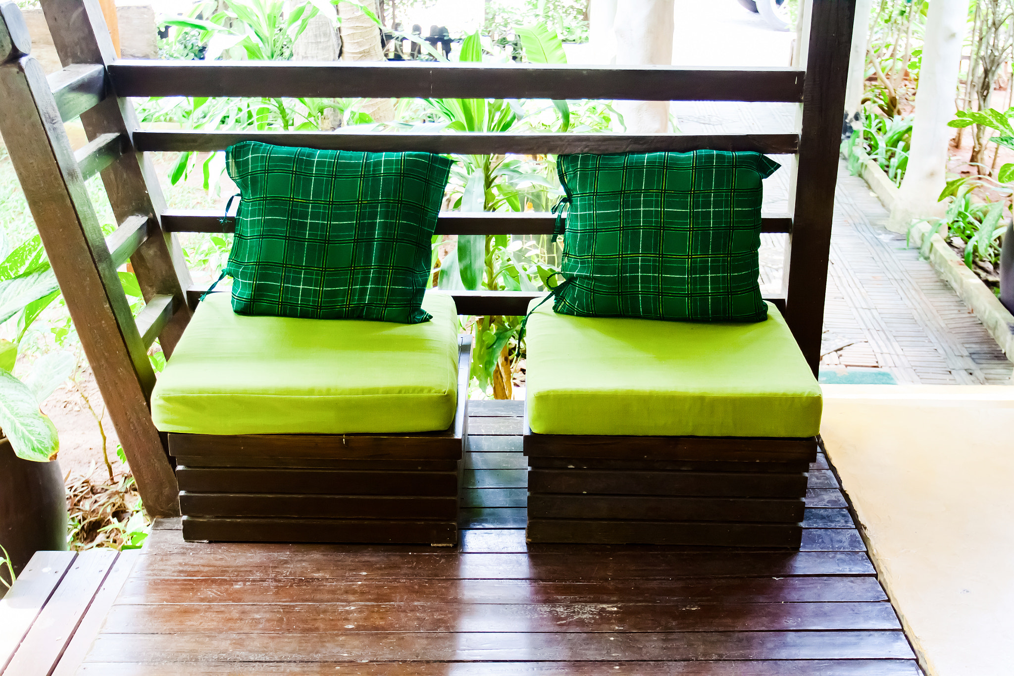 Canon EOS 50D + Canon EF 17-40mm F4L USM sample photo. Green chairs decorate photography