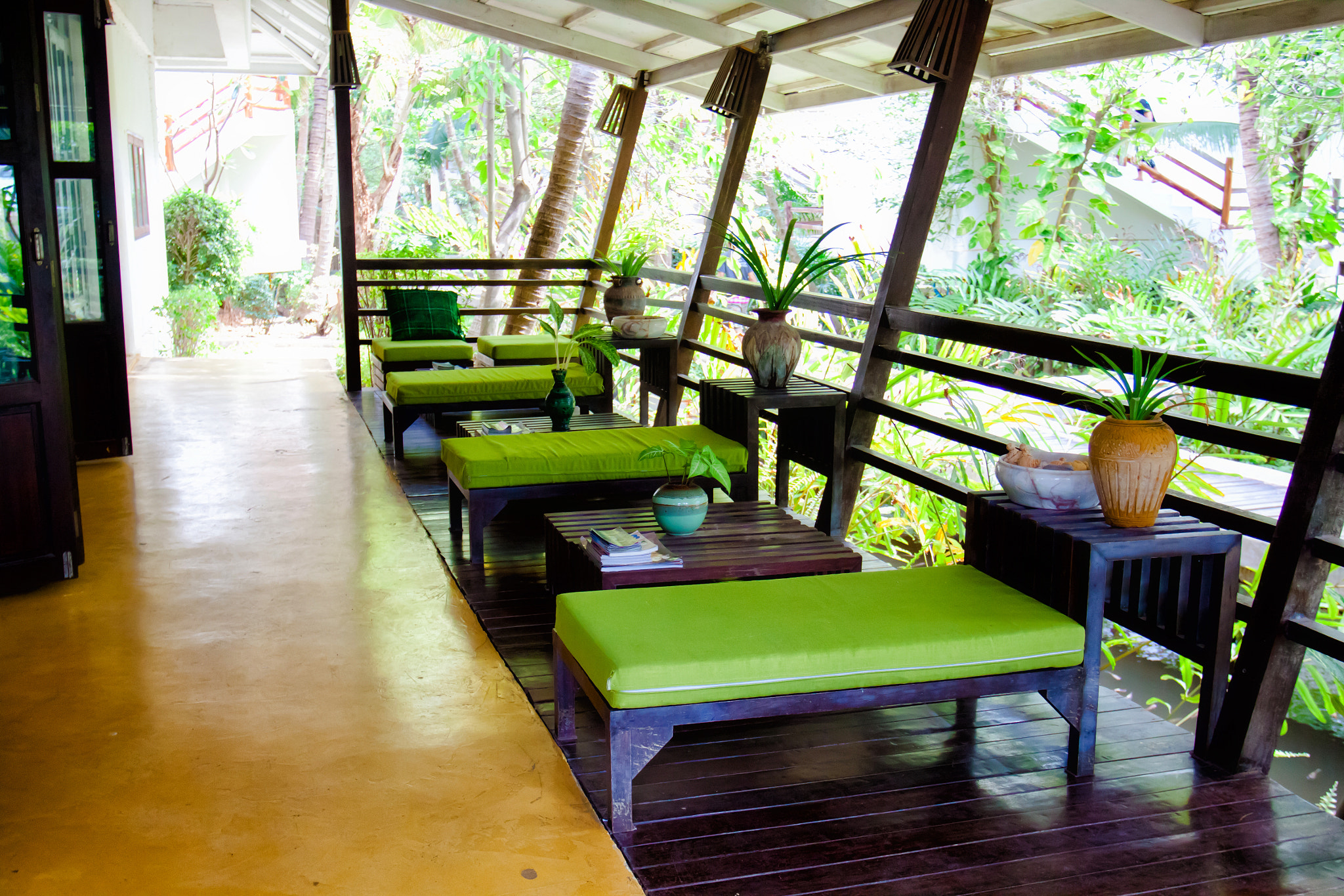Canon EOS 50D + Canon EF 17-40mm F4L USM sample photo. Green chairs decorate photography