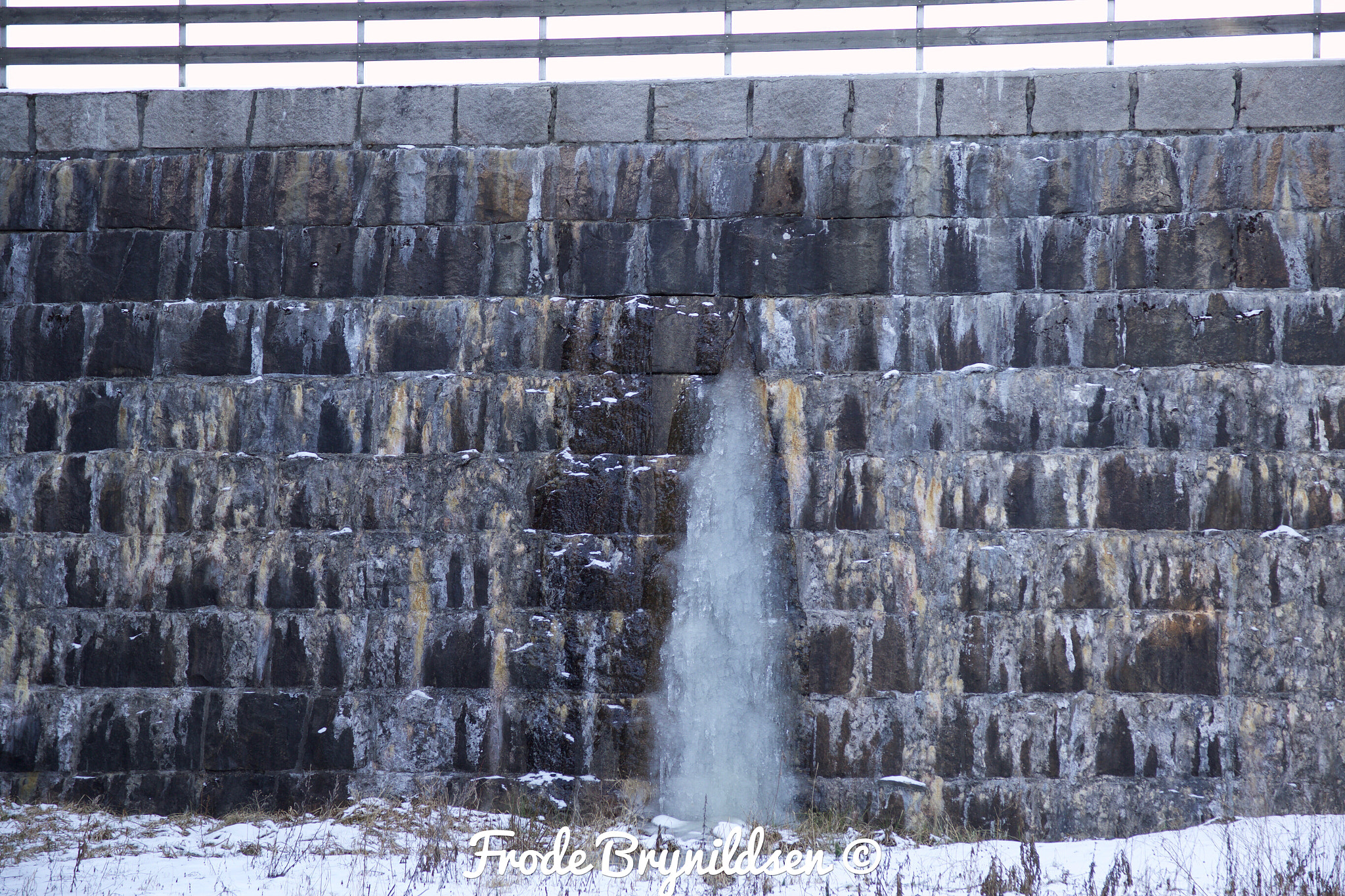 Sigma 17-70mm F2.8-4 DC Macro OS HSM sample photo. This is a dam wall with a frozen leak. photography