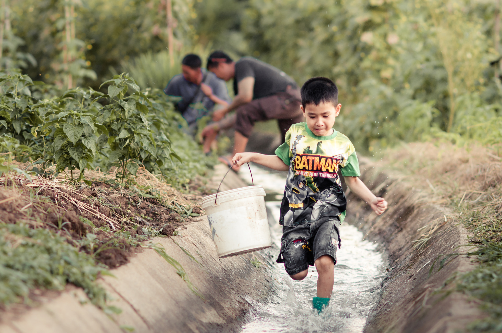 Nikon D300 + AF DC-Nikkor 135mm f/2D sample photo. Happy boy running in the water. photography