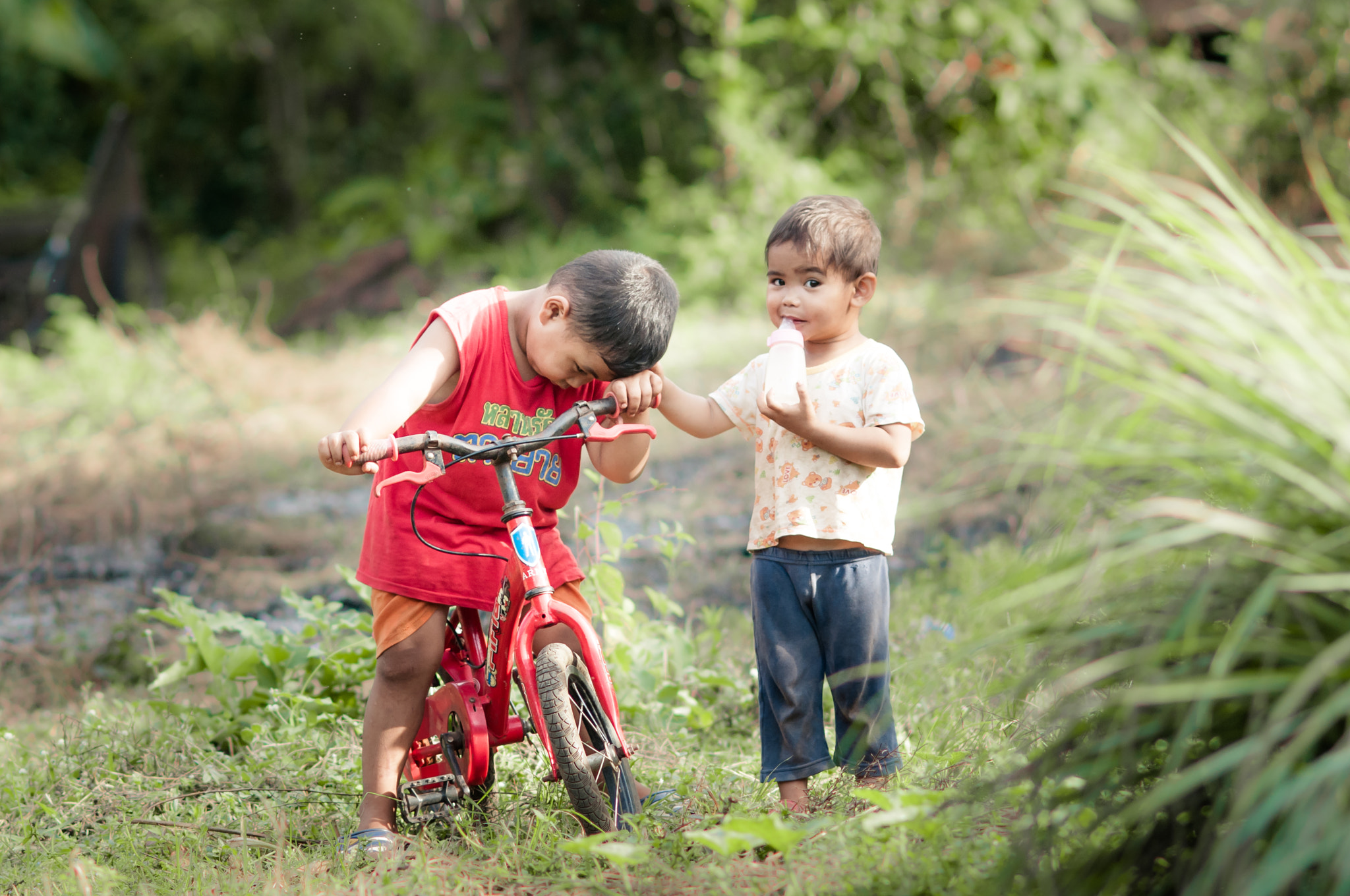 Nikon D300 + AF DC-Nikkor 135mm f/2D sample photo. Two little boys in local place.chiang mai.thailand photography