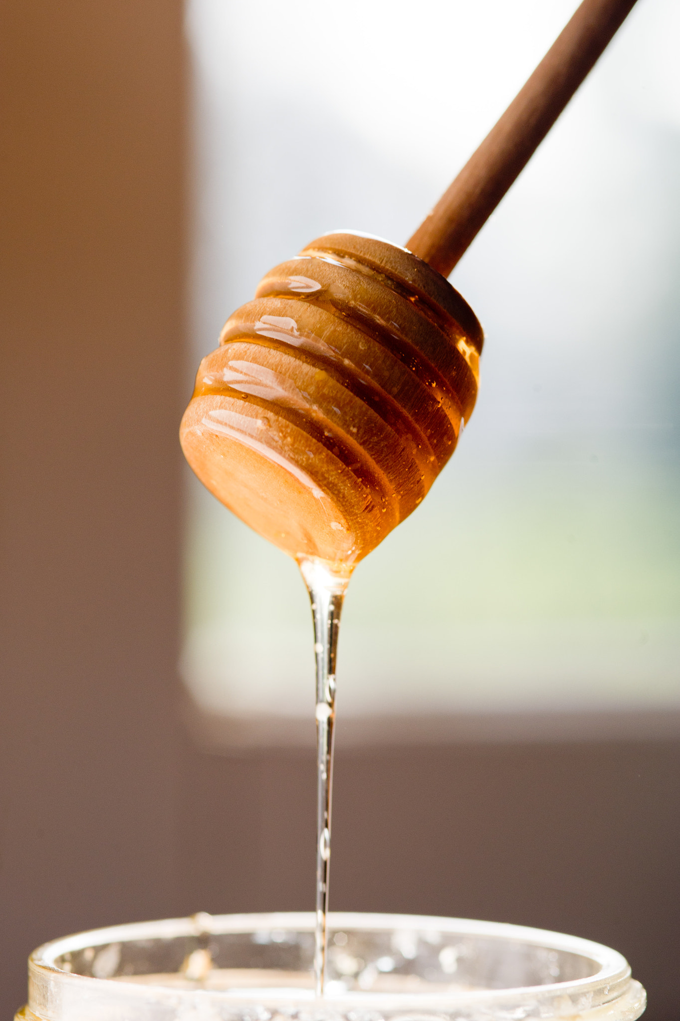 Nikon D3S sample photo. Honey dipper over honey jar photography