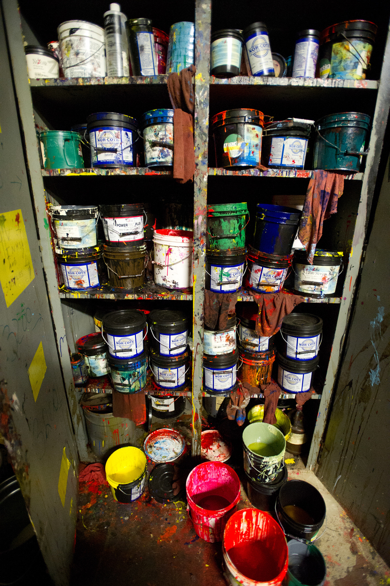 Nikon AF-S Nikkor 17-35mm F2.8D ED-IF sample photo. Shelves of print inks photography