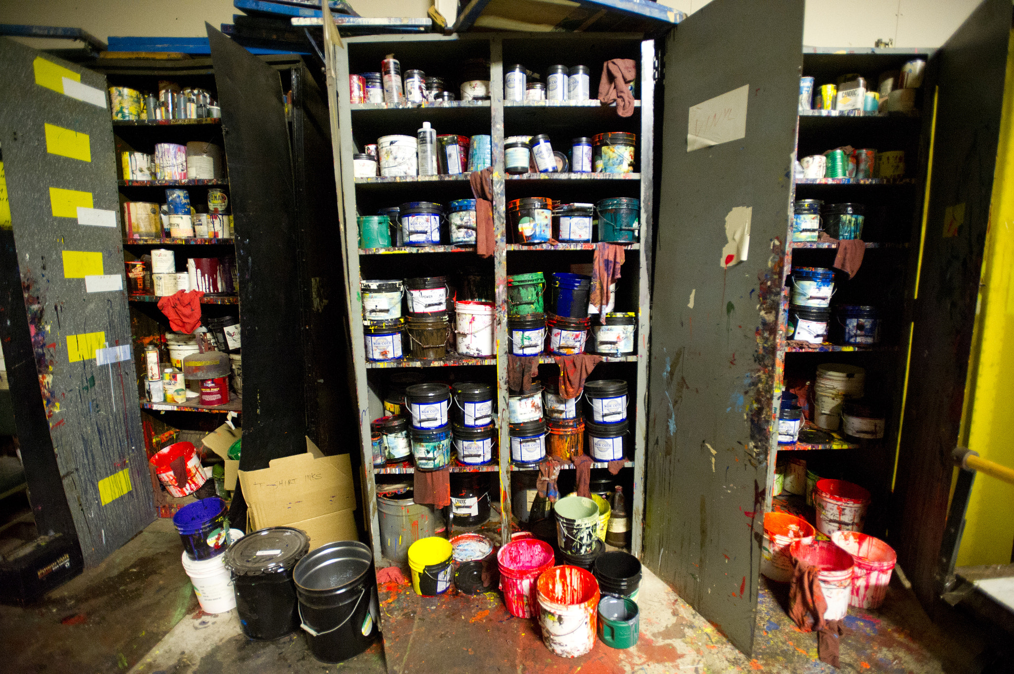 Nikon AF-S Nikkor 17-35mm F2.8D ED-IF sample photo. Shelves of print inks photography