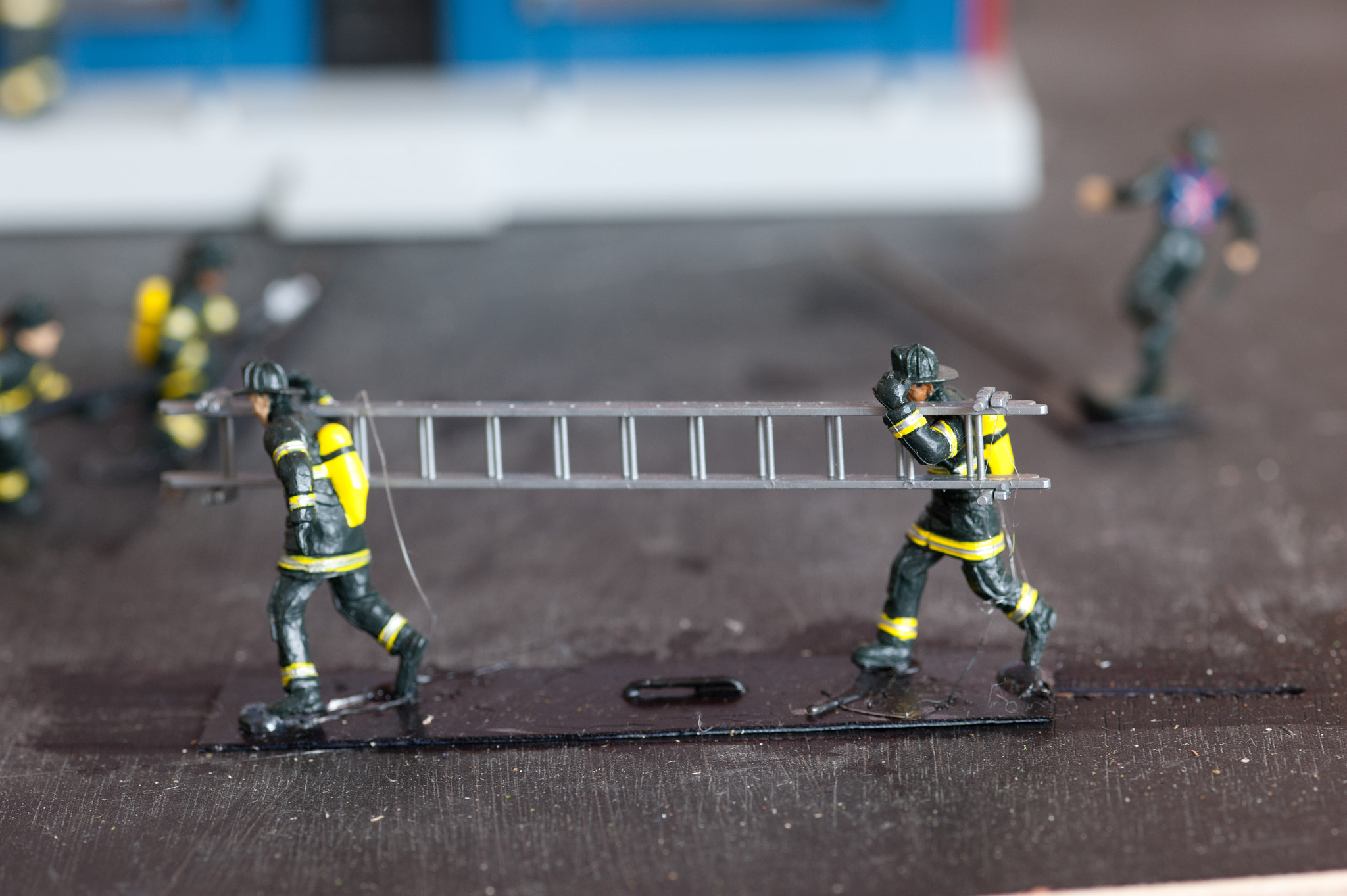 Nikon D700 sample photo. Miniature firefighters of a train garden photography