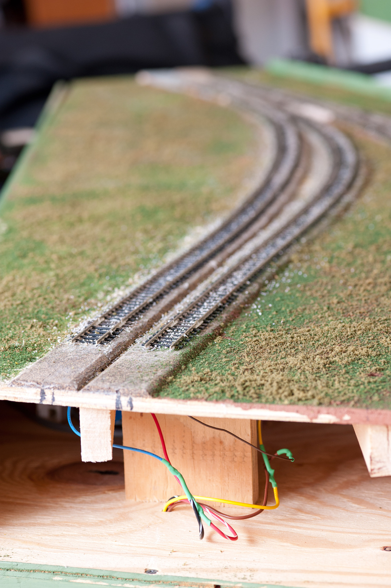 ZEISS Makro-Planar T* 100mm F2 sample photo. Train tracks of a train garden photography