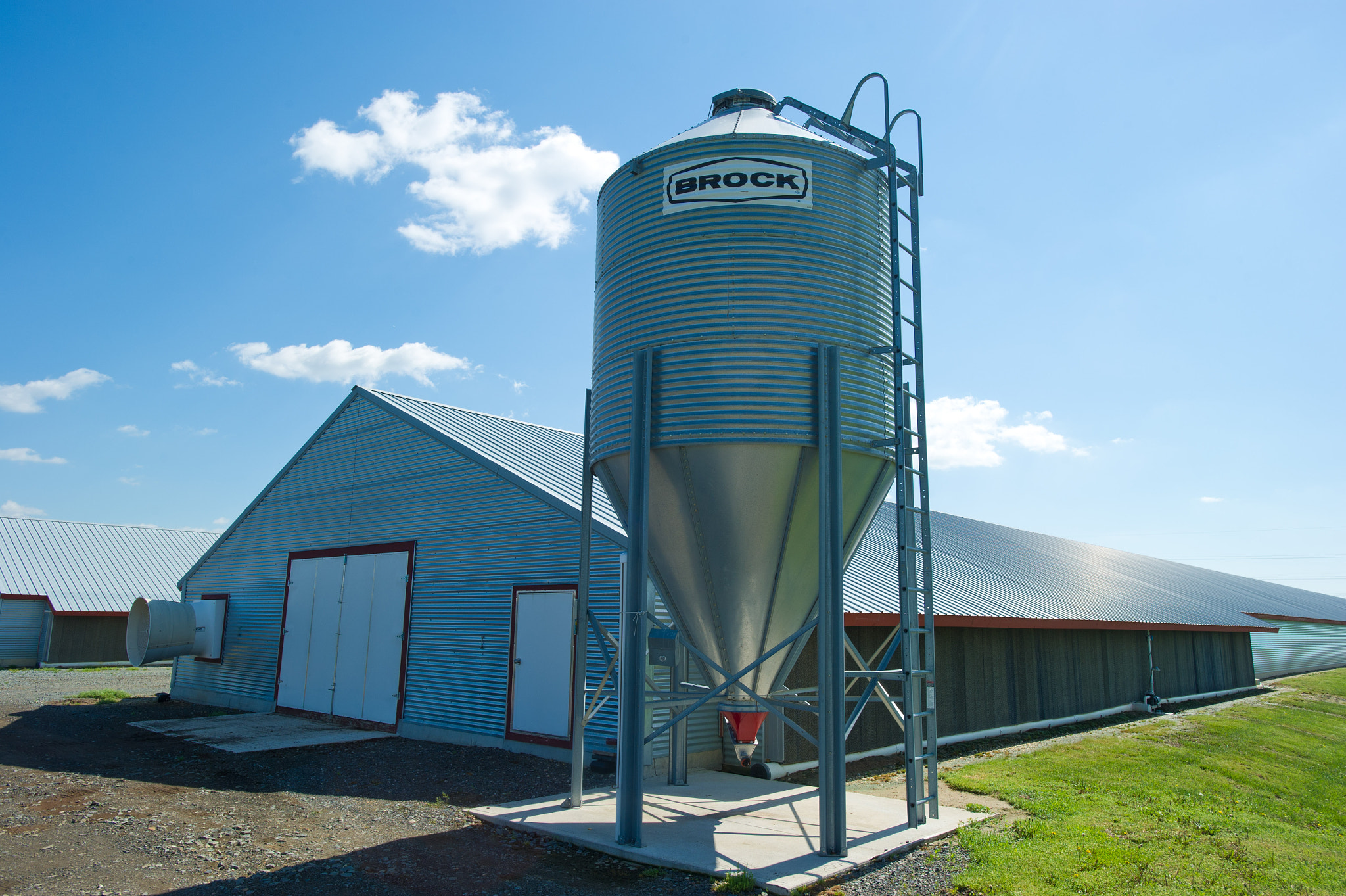 Nikon AF-S Nikkor 17-35mm F2.8D ED-IF sample photo. Silo and barn structure on farm photography