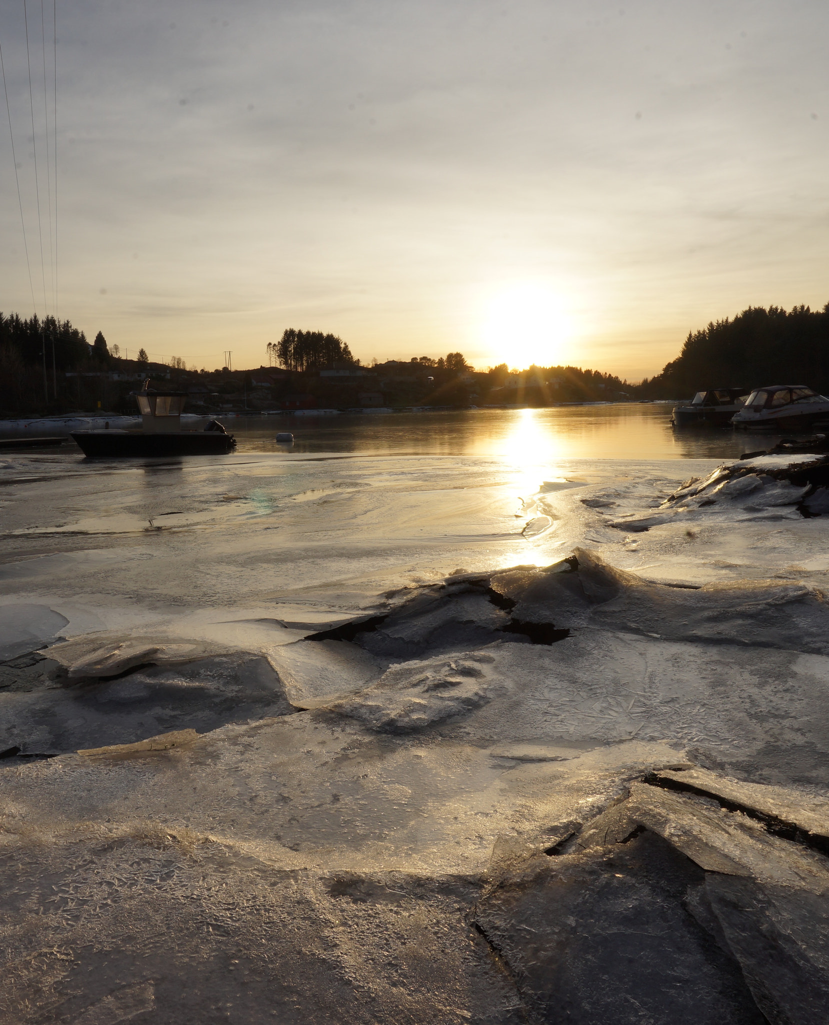 Sony a7 + Sony Vario-Tessar T* FE 16-35mm F4 ZA OSS sample photo. From rossland 35 km north of bergen, norway. frozen salt water close to sunset photography