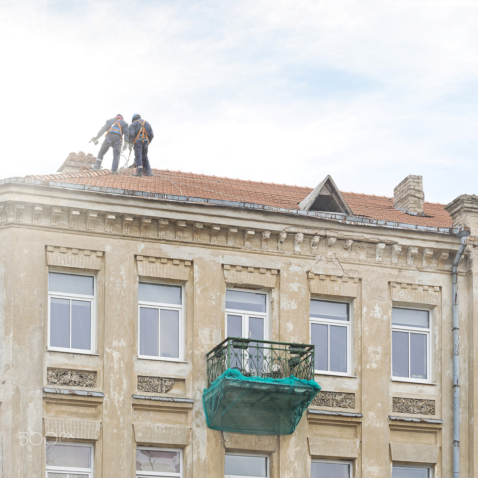 Nikon D610 sample photo. Roof repair of old building photography