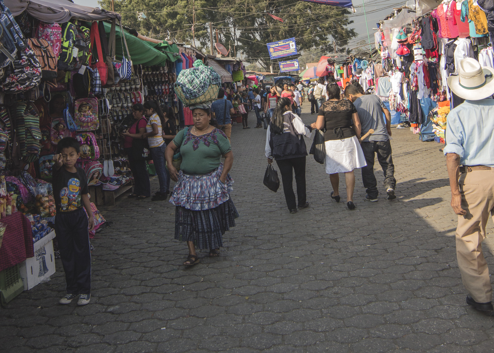 Nikon D3200 sample photo. Boy in market photography