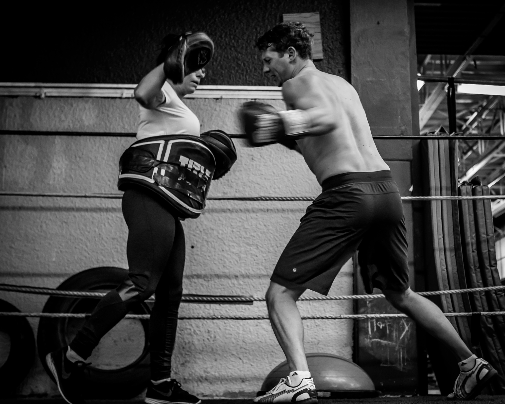 Olympus OM-D E-M1 + Olympus M.Zuiko Digital 25mm F1.8 sample photo. Boxing training black & white photography