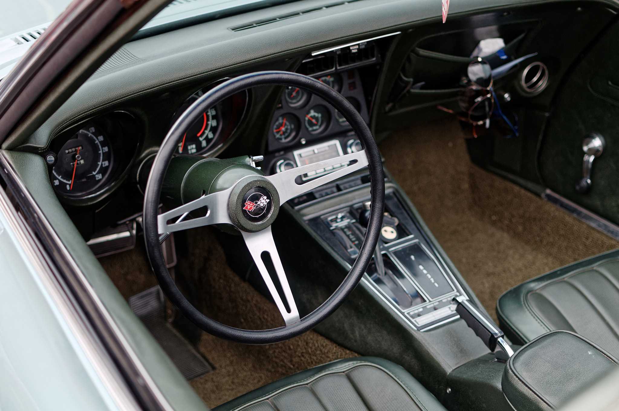 Nikon D300S + Nikon AF-S DX Nikkor 35mm F1.8G sample photo. The green vette dashboard photography