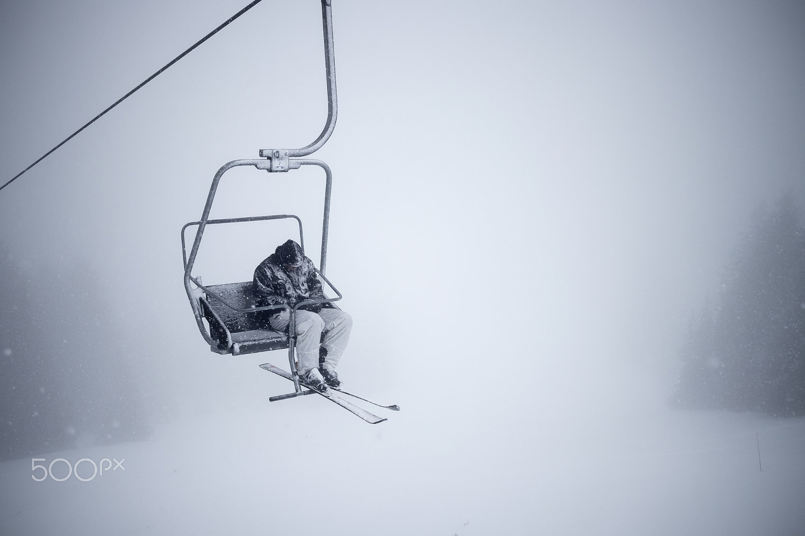 Canon EF-S 24mm F2.8 STM sample photo. Lonely skier photography