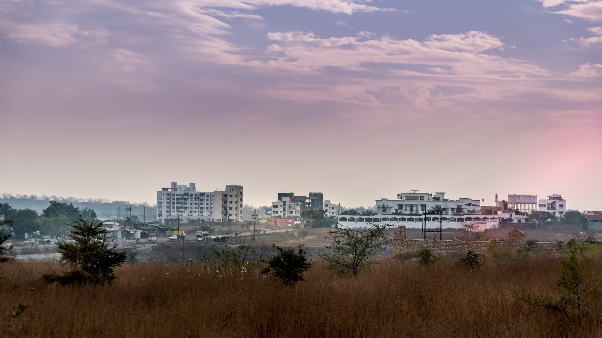 Nikon D5500 + Sigma 17-50mm F2.8 EX DC OS HSM sample photo. City from forest photography