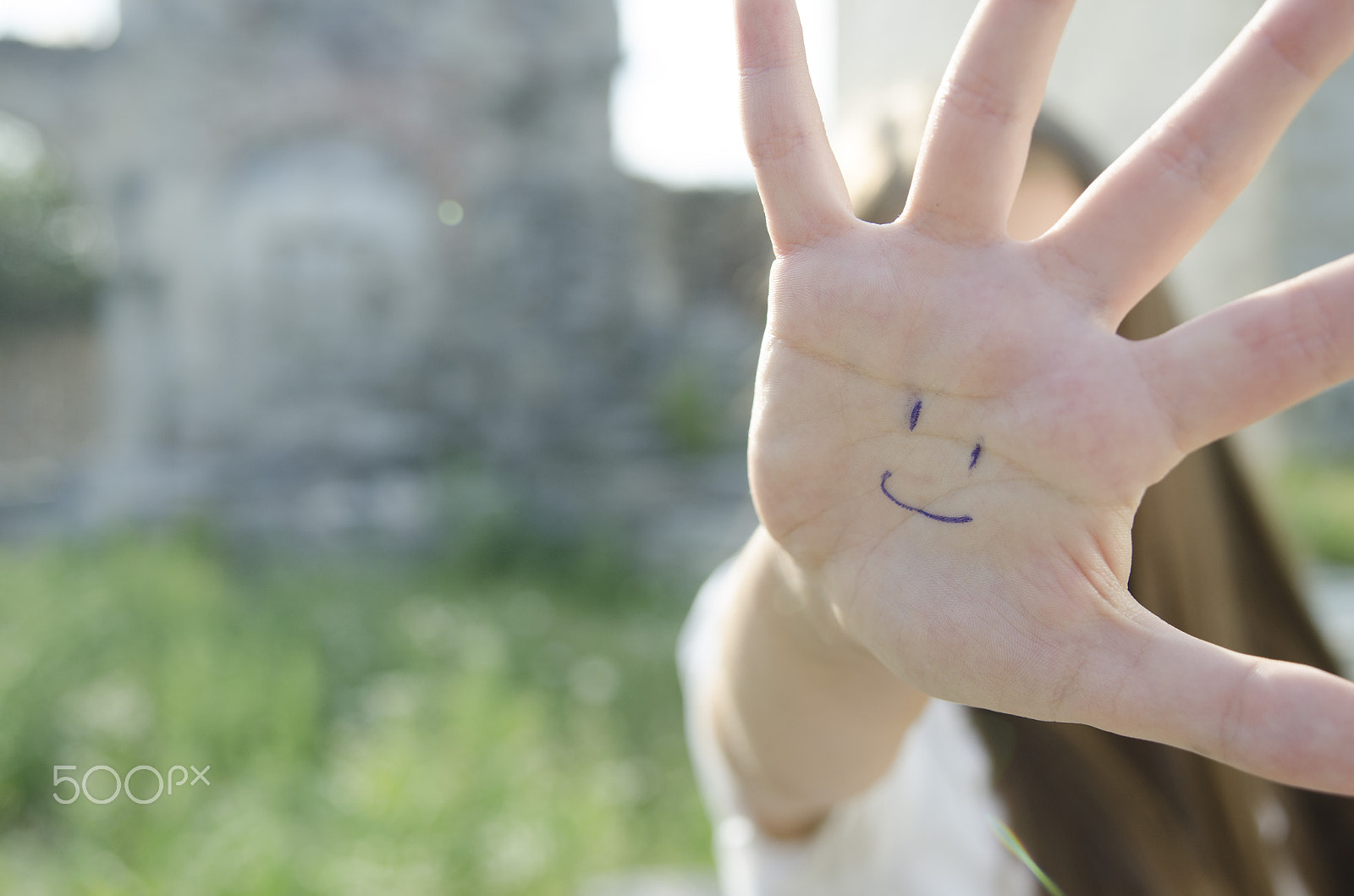 Nikon AF Nikkor 24-85mm F2.8-4D IF sample photo. Palm with smile, happiness concept, blurred photo for background photography
