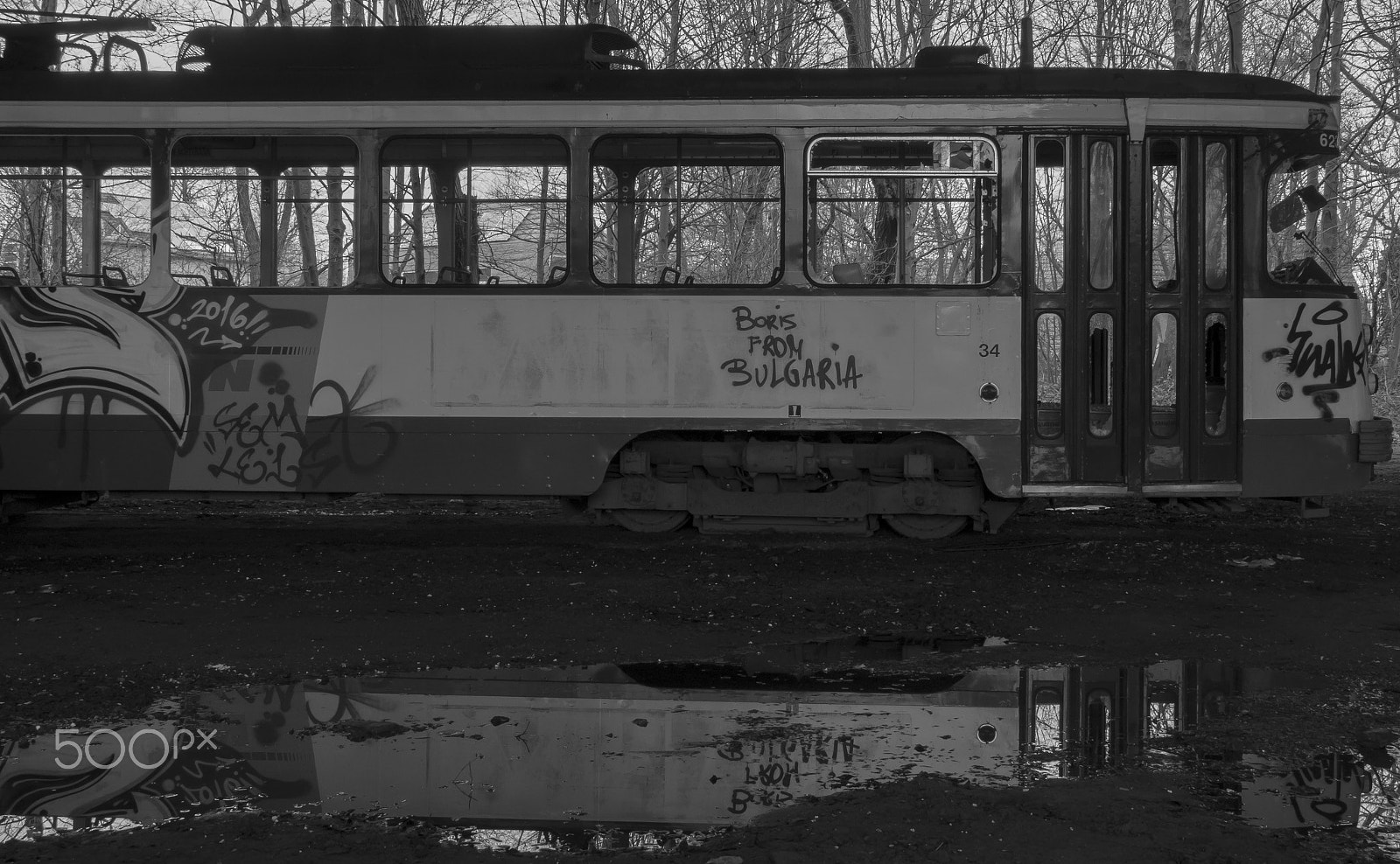 Samsung NX300 + Samsung NX 18-200mm F3.5-6.3 ED OIS sample photo. The tram and its reflection photography