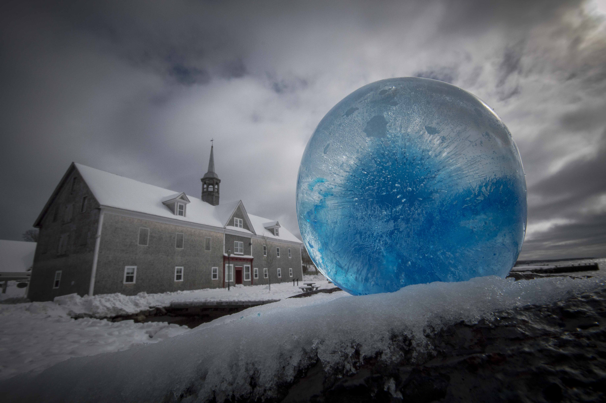 Sigma 10-20mm F4-5.6 EX DC HSM sample photo. Snow and a globe photography