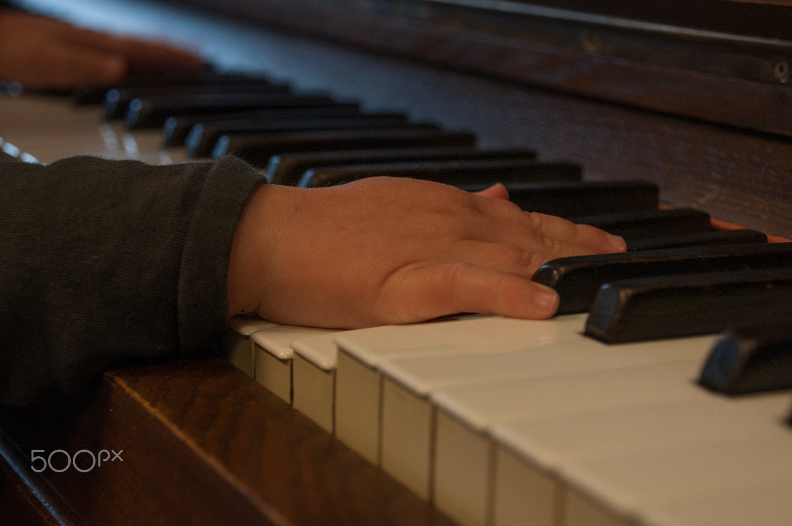 Nikon D90 sample photo. 2 year old child playing the piano photography