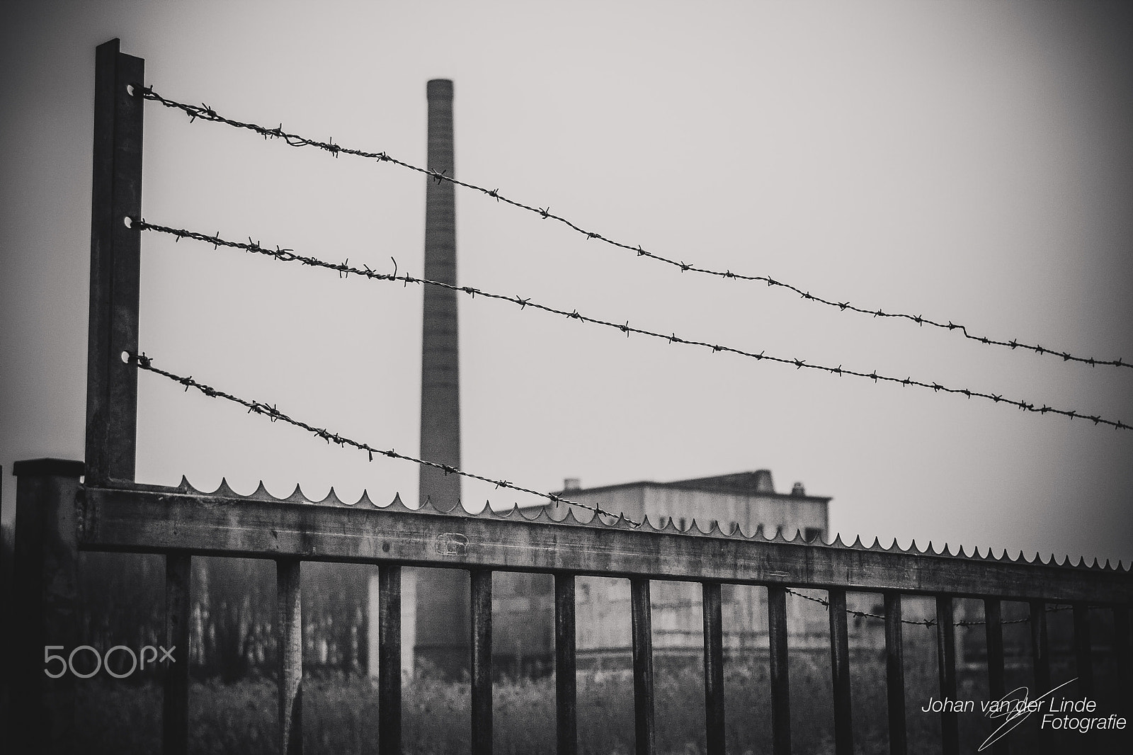 Canon EOS 40D + Canon EF 24-105mm F4L IS USM sample photo. Factory behind fences photography