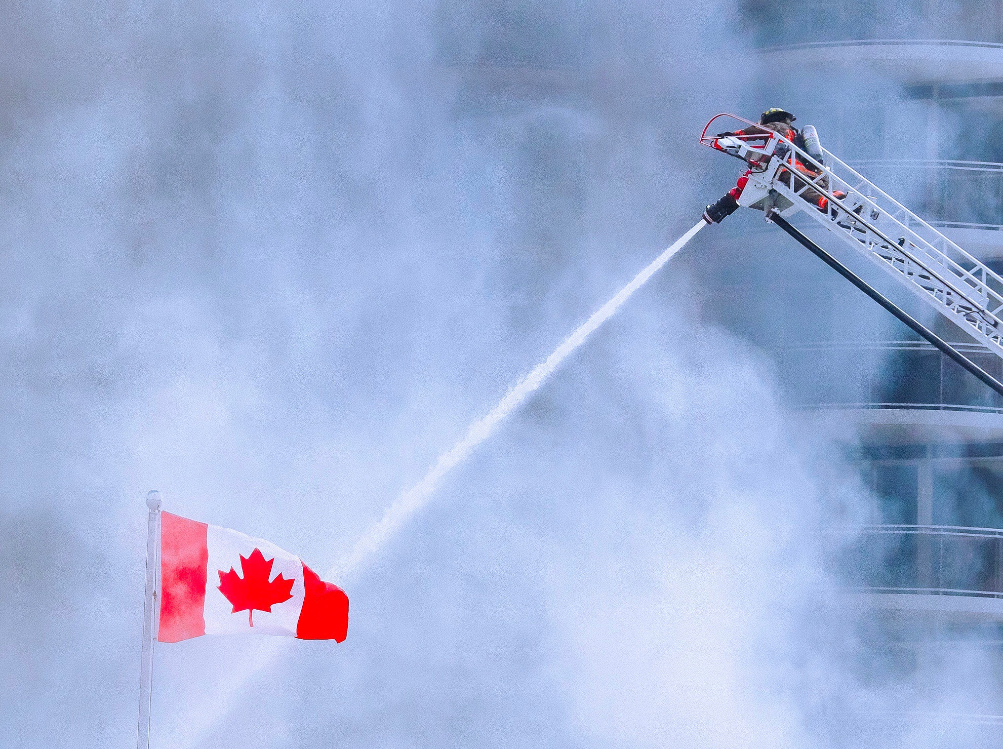 OLYMPUS M.14-150mm F4.0-5.6 II sample photo. Toronto, canada - february 14, 2017: firefighters  ... photography