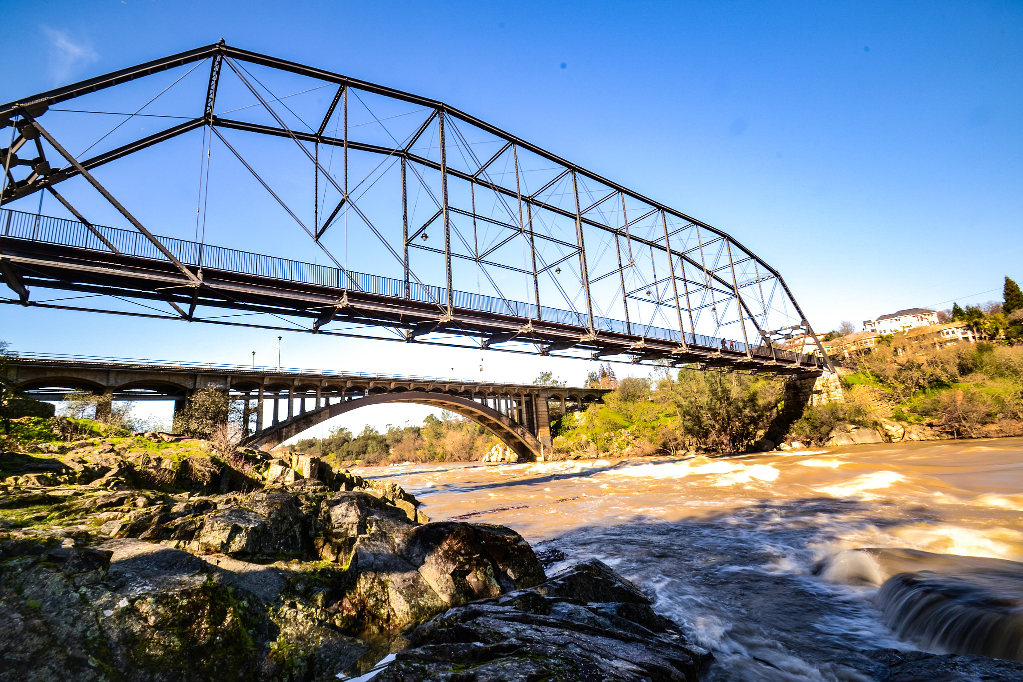 Nikon D3100 + Tamron SP AF 10-24mm F3.5-4.5 Di II LD Aspherical (IF) sample photo. The water is ragging on the american river in folsom, ca photography