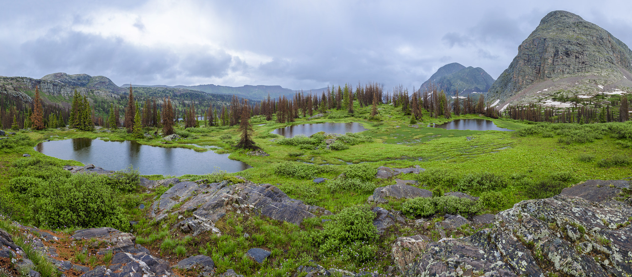 Sigma 17-50mm F2.8 EX DC OS HSM sample photo. Rainy mountain vista photography