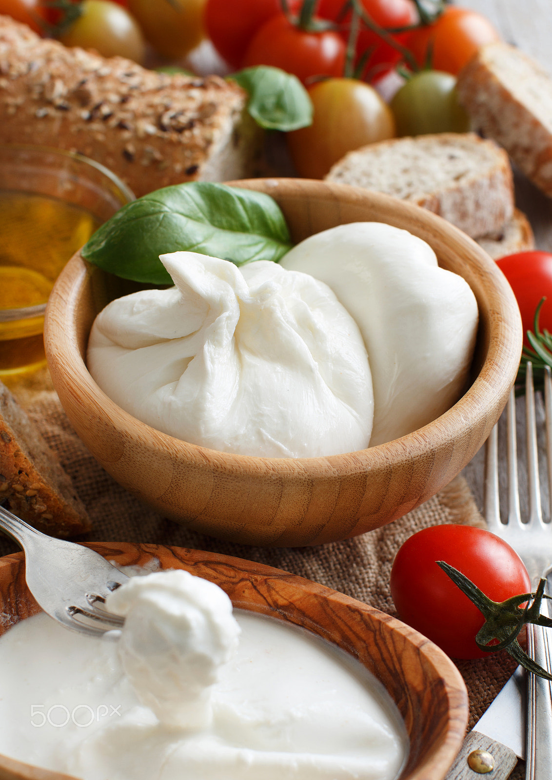 Canon EOS 650D (EOS Rebel T4i / EOS Kiss X6i) + Canon EF 50mm F1.2L USM sample photo. Italian cheese burrata, tomatoes, basil and bread photography
